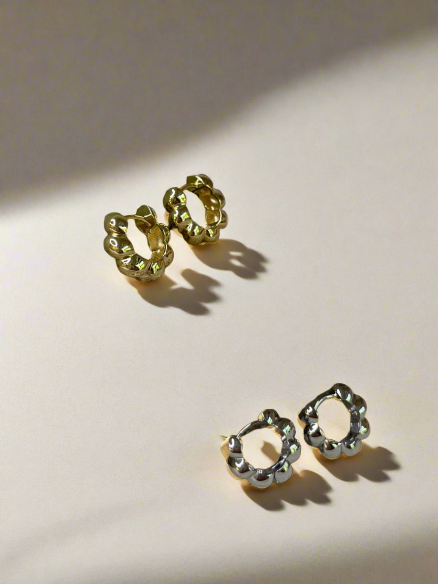 Radiant Twist Gold Dipped Huggie Earrings